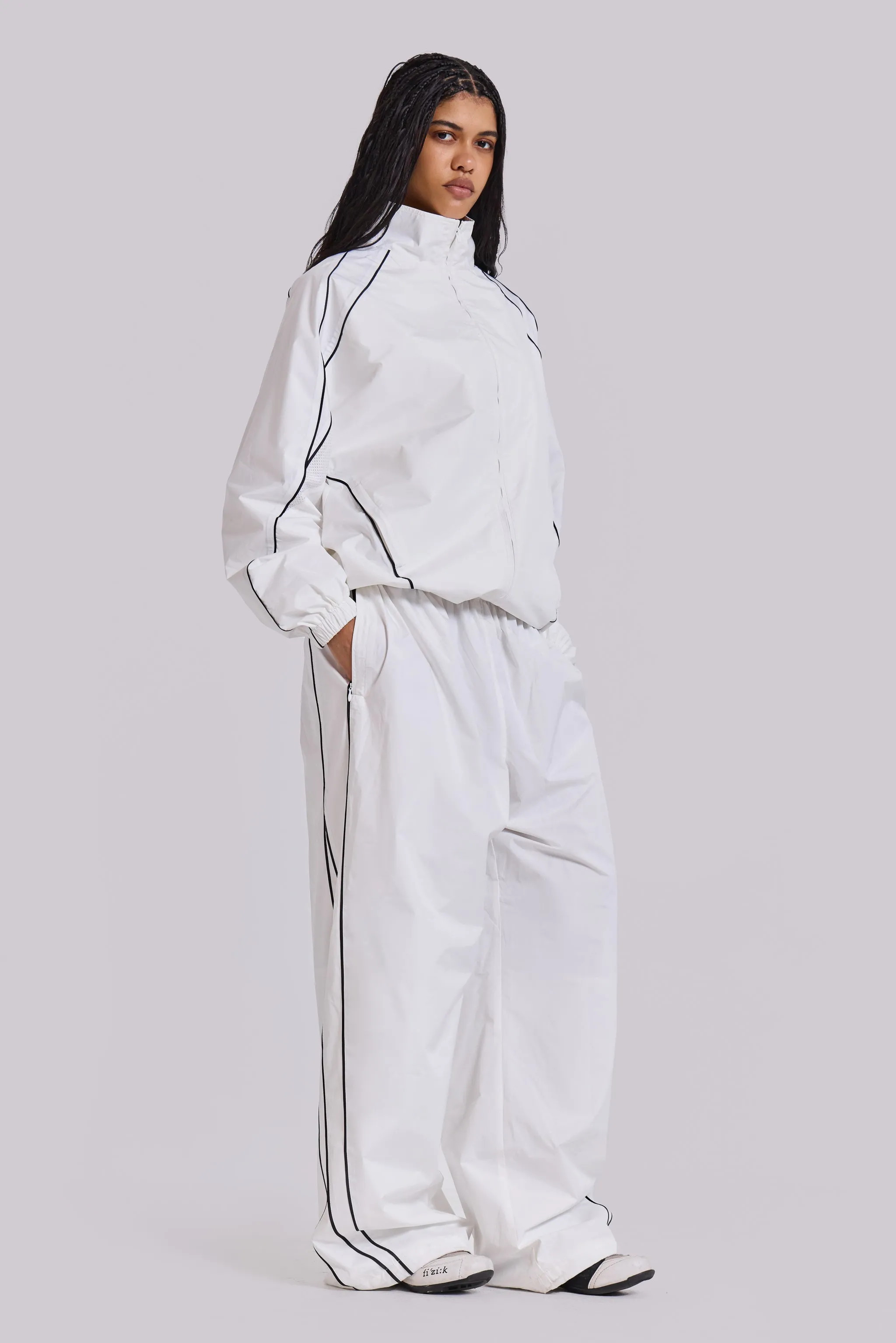 White Vapor Tracksuit Bottoms sold by Jaded London