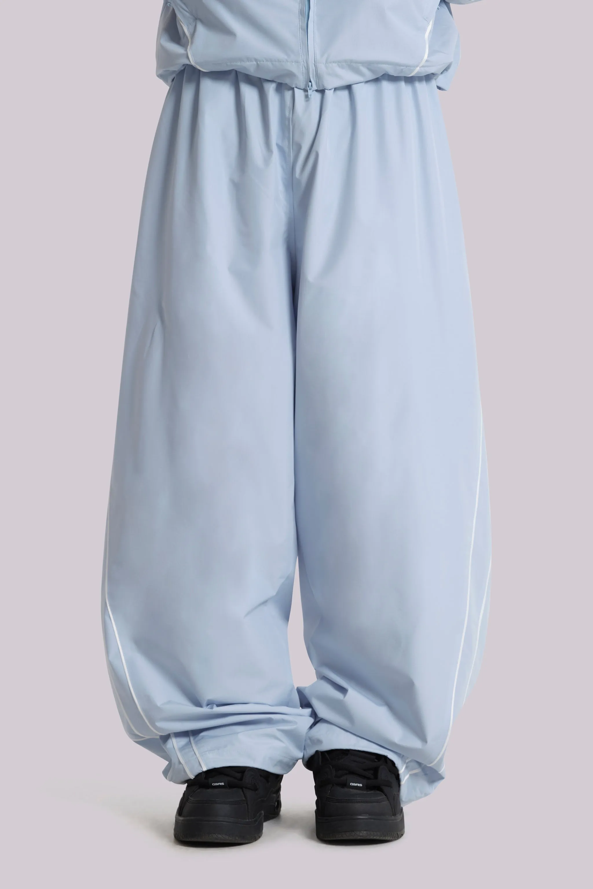 Blue Vapor Tracksuit Bottoms sold by Jaded London