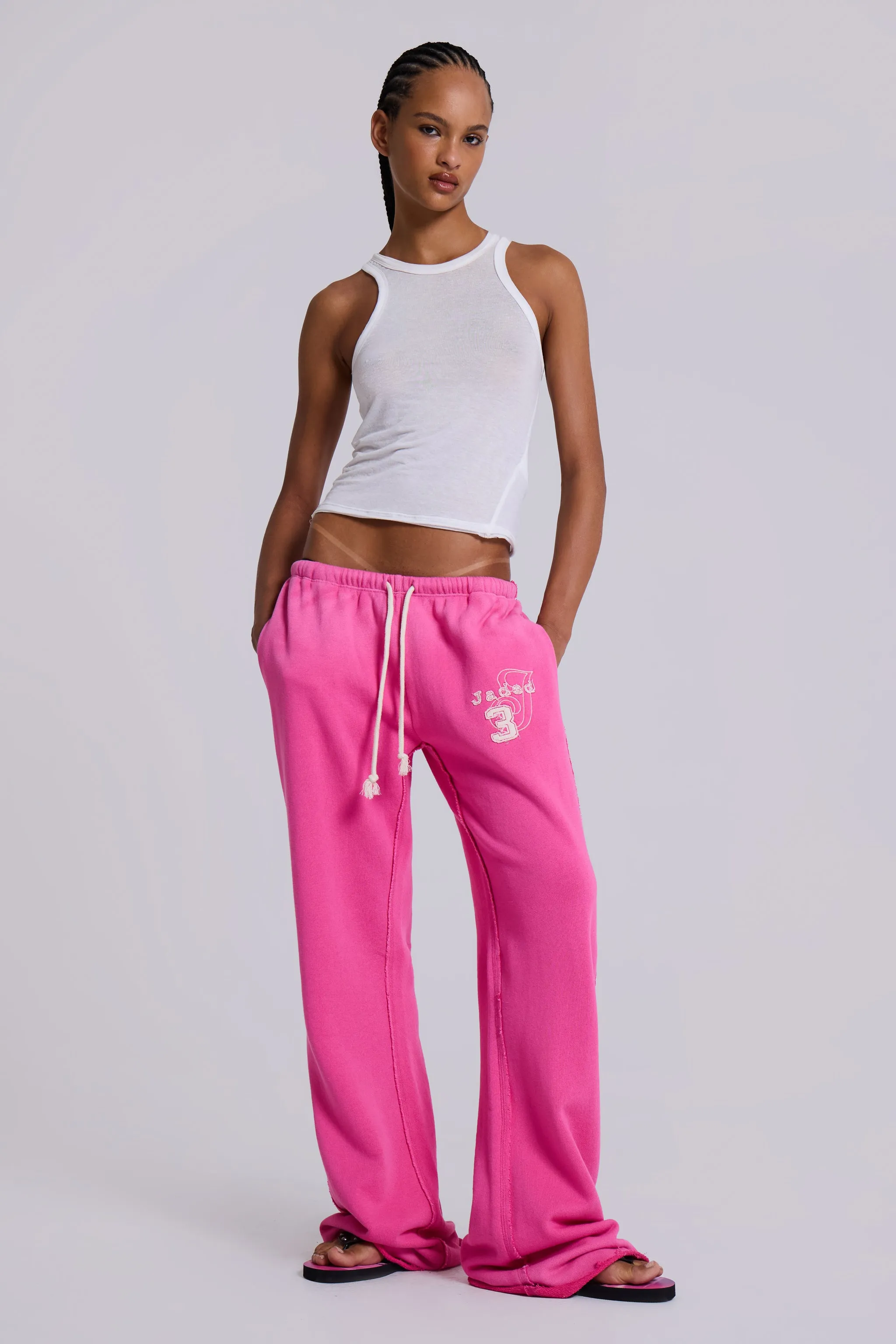 Cleo Slouchy Bootcut Jogger in Pink sold by Jaded London