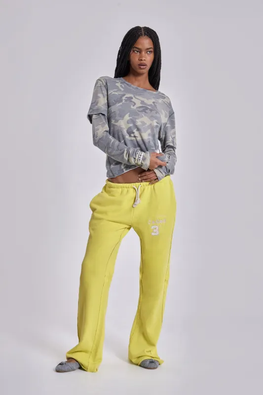 Cleo Slouchy Bootcut Jogger in Neon sold by Jaded London