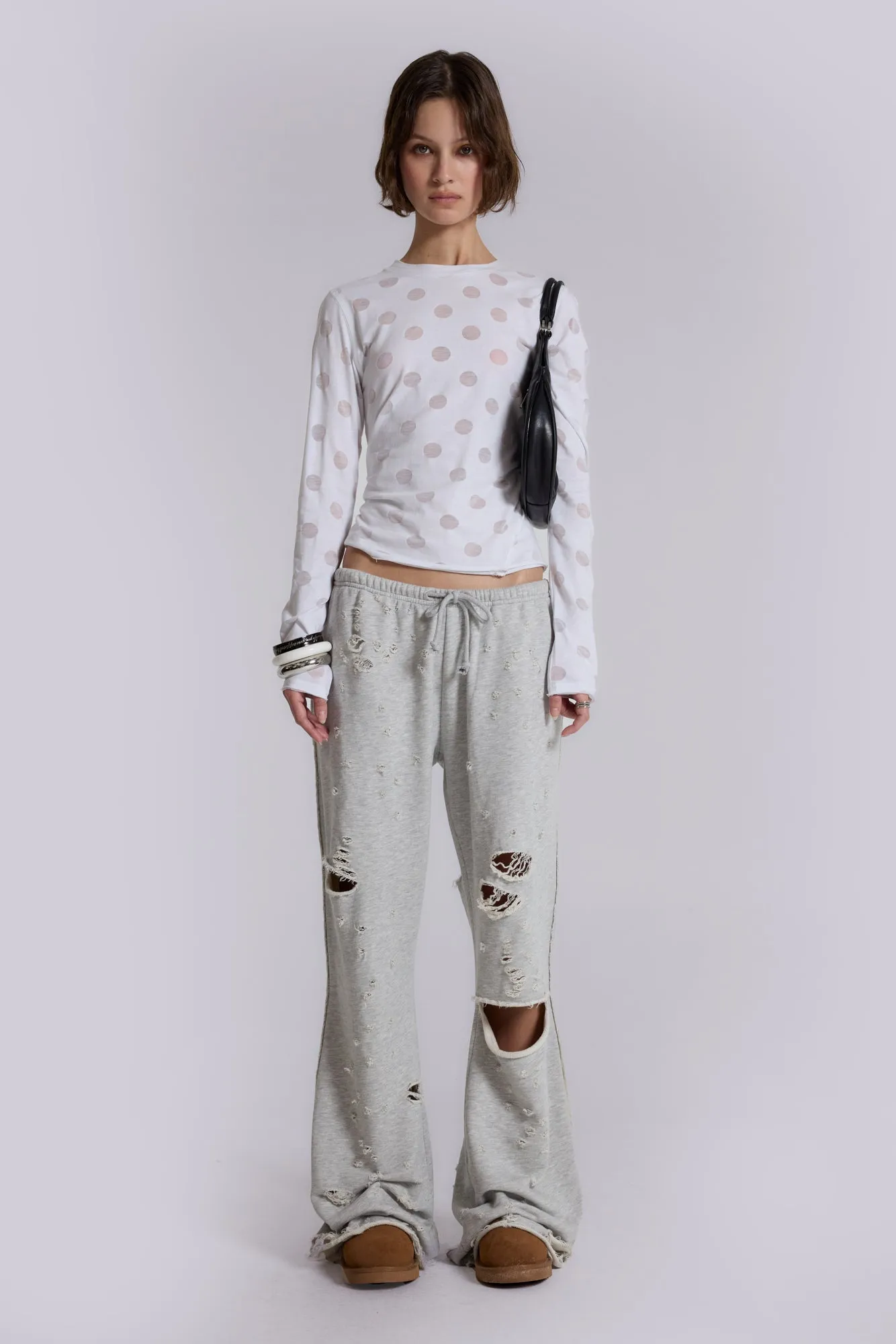 Cleo Distressed Slouchy Bootcut Joggers sold by Jaded London