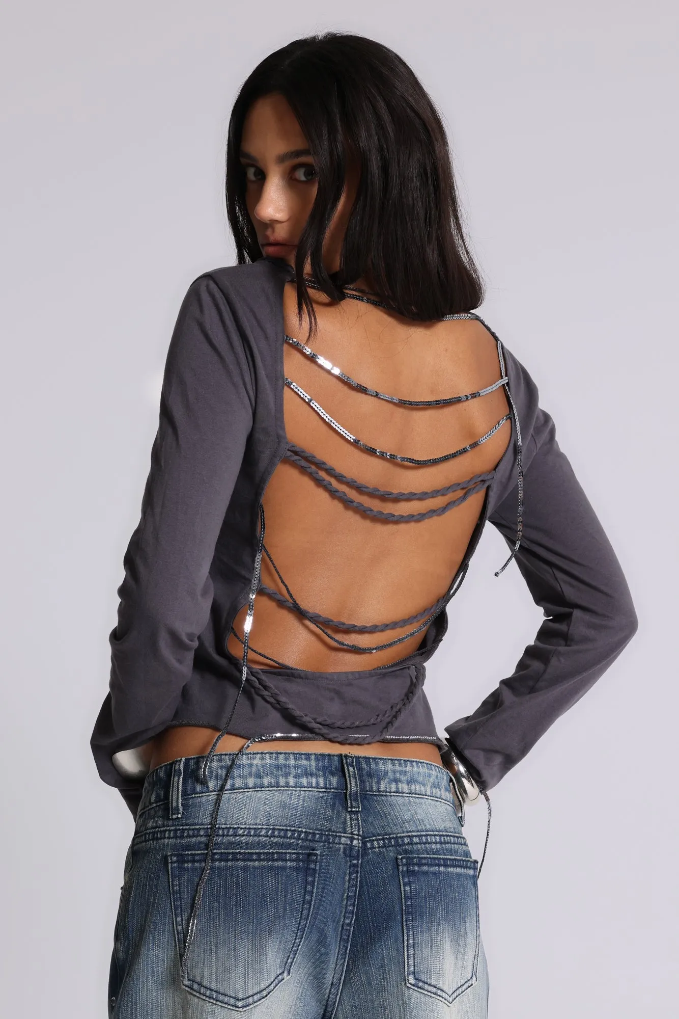 Fira Sequin V Neck Tee sold by Jaded London