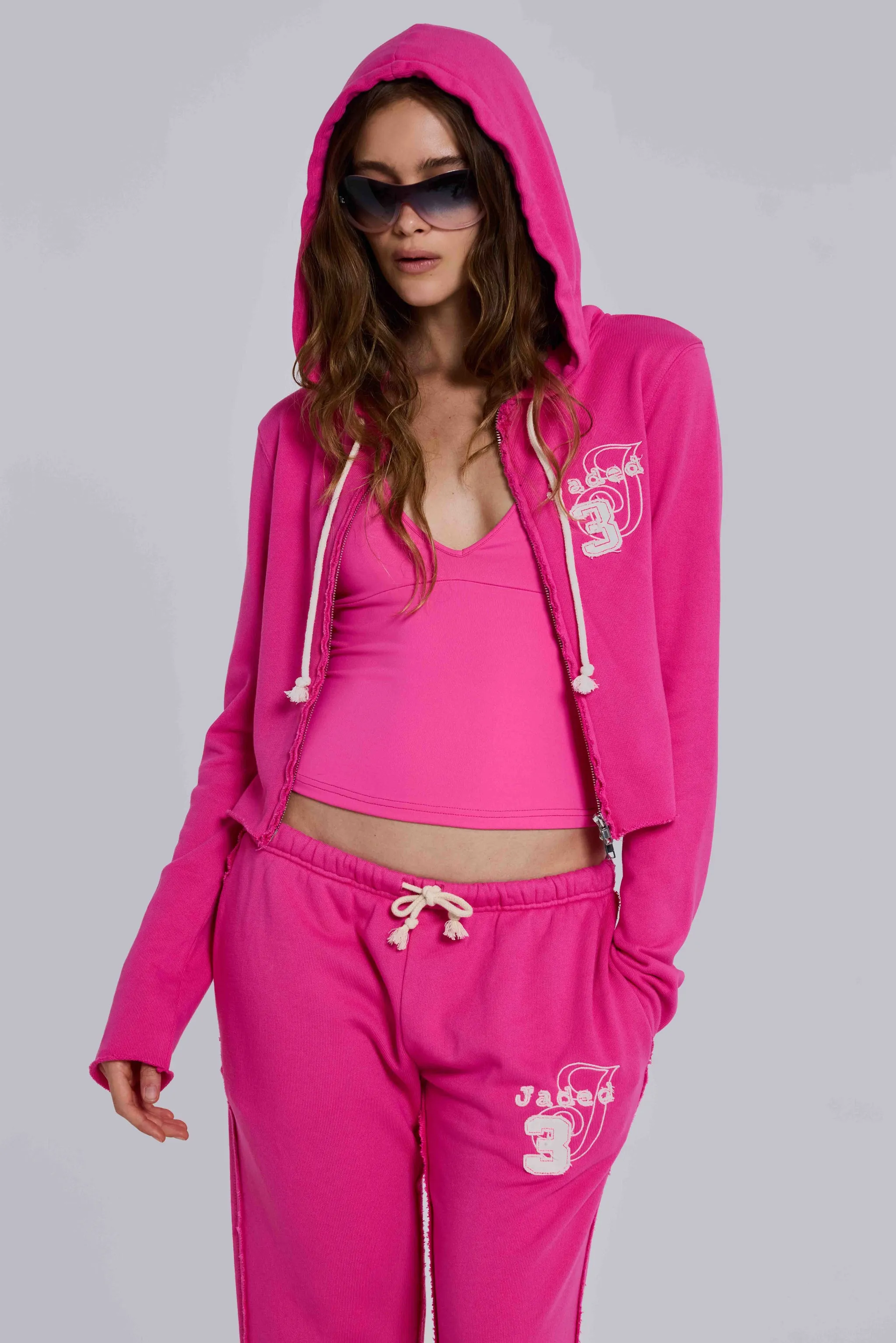 Cleo Zip Through Hoodie in Pink sold by Jaded London