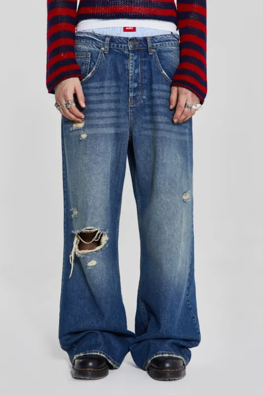 Vintage Blue Colossus Flare Jeans sold by Jaded London