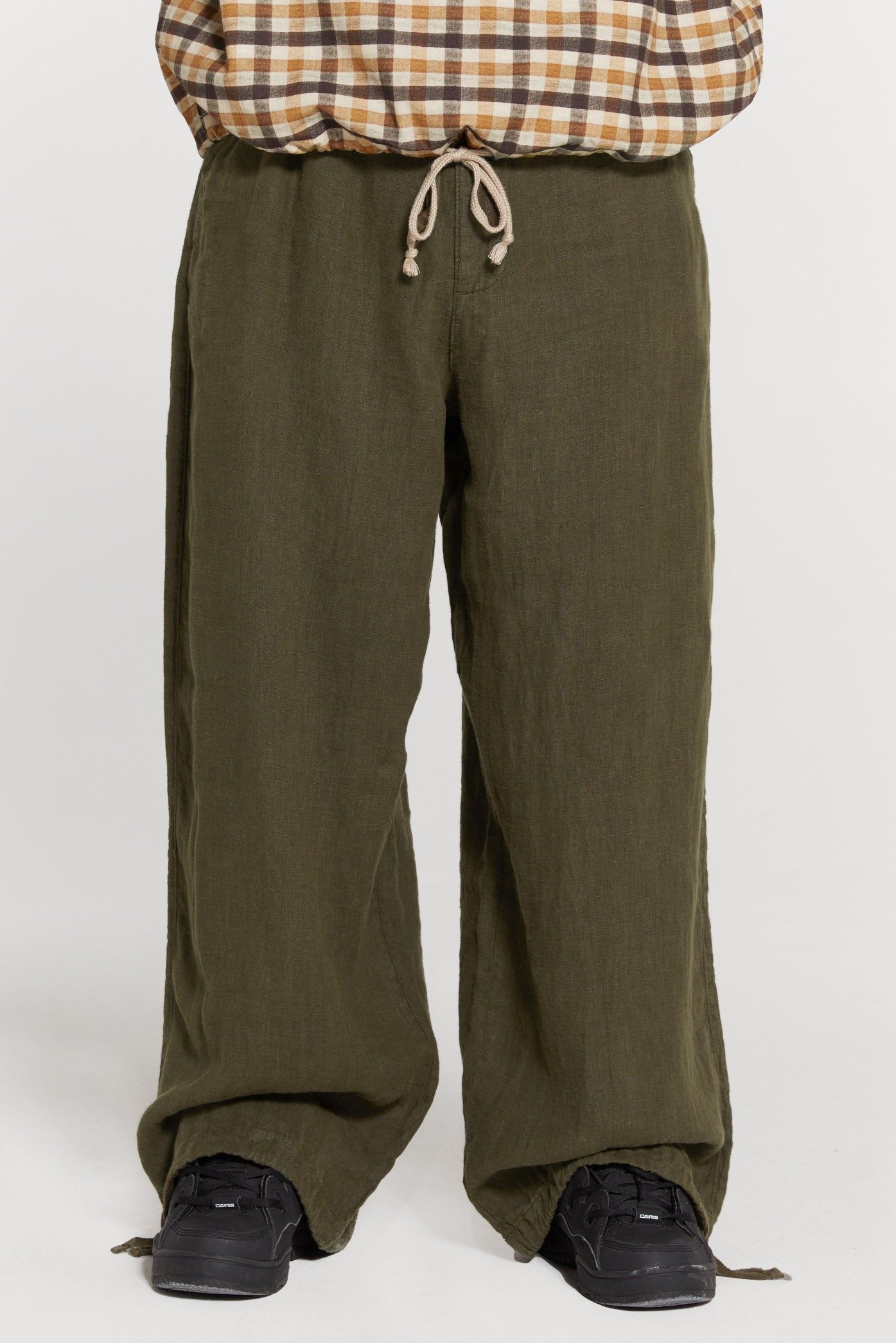 Khaki Navagio Linen Trousers sold by Jaded London