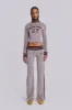 27 Velour Low Rise Bootcut Trousers sold by Jaded London