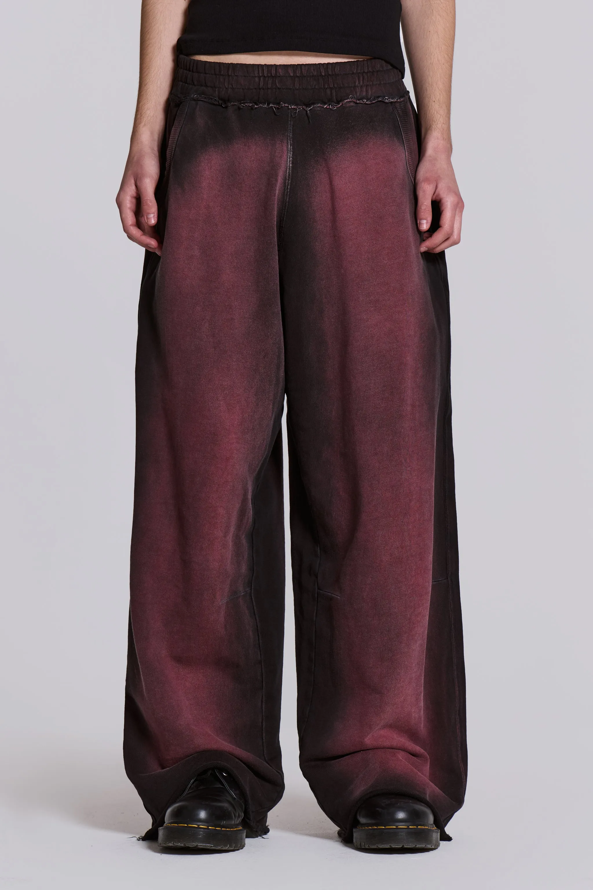 Deep Red Fade Baggy Monster Joggers sold by Jaded London