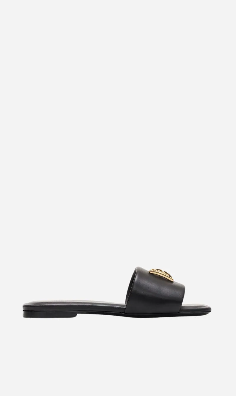 Anine Bing | Ria Slides Gold Hardware - Black sold by Sisters & Co