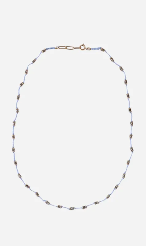 Tityaravy | Long Lotus Necklace - Lilac / Smoky Quartz sold by Sister & Co