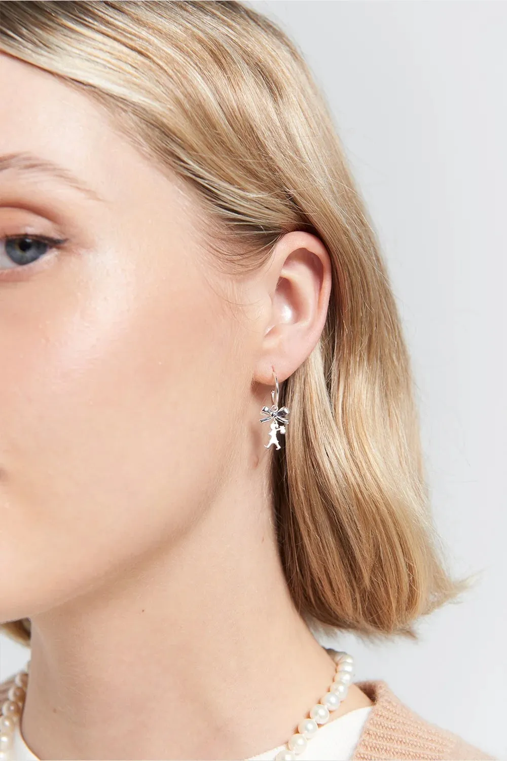Karen Walker | Mini Girl With A Bow Hoops - Silver sold by Sister & Co product image thumbnail 2