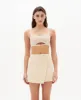 Nagnata | Marina Mini Skirt - Shell sold by Sister & Co