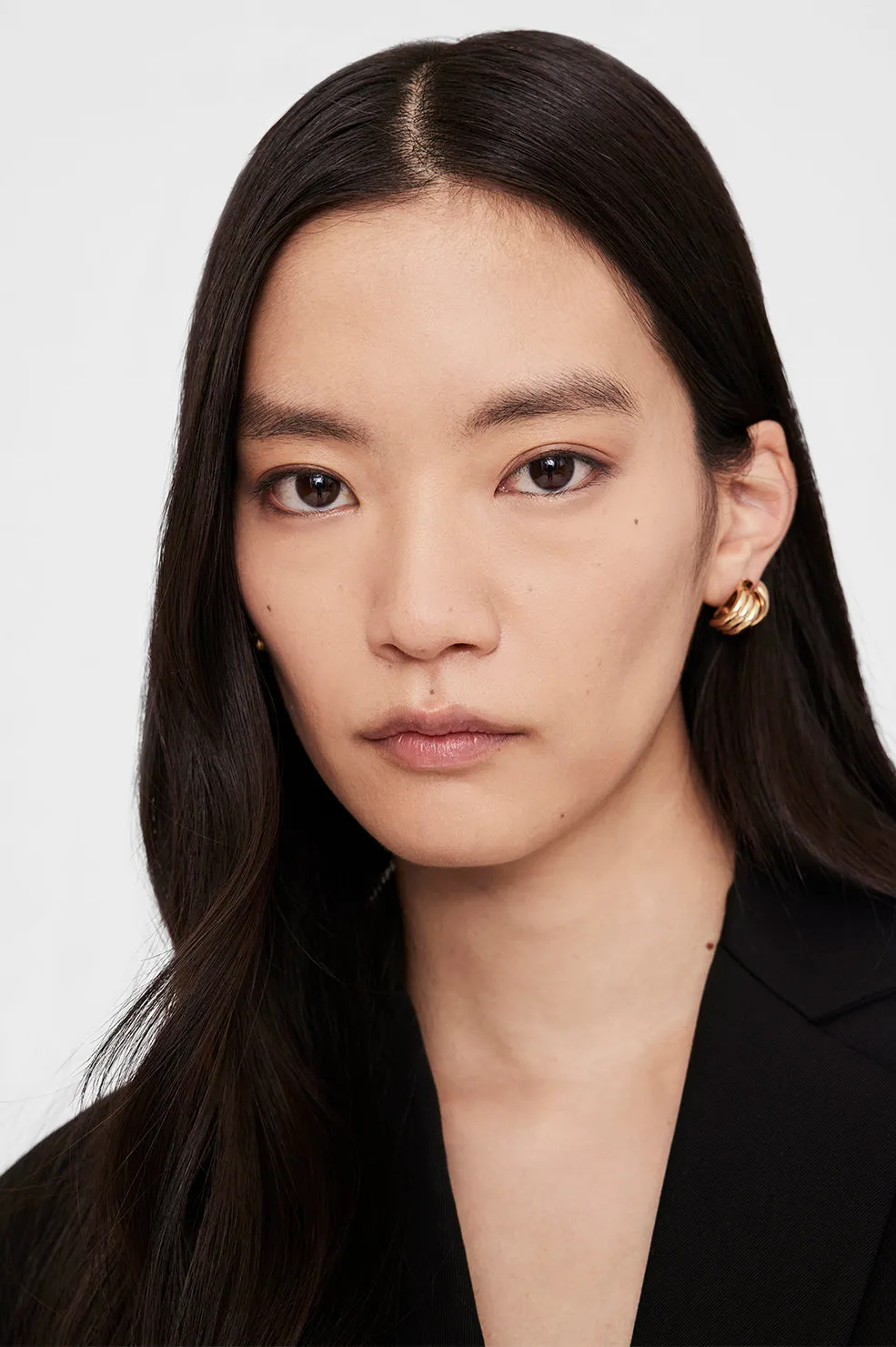 Anine Bing | Small Crossover Ribbed Earrings - Gold sold by Sister & Co product image thumbnail 2