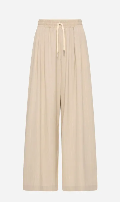 St Agni | Pinstripe Wool Drawstring Pants - Latte sold by Sister & Co