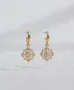 Zoe & Morgan | Centered Earrings - Gold/White Zircon sold by Sister & Co