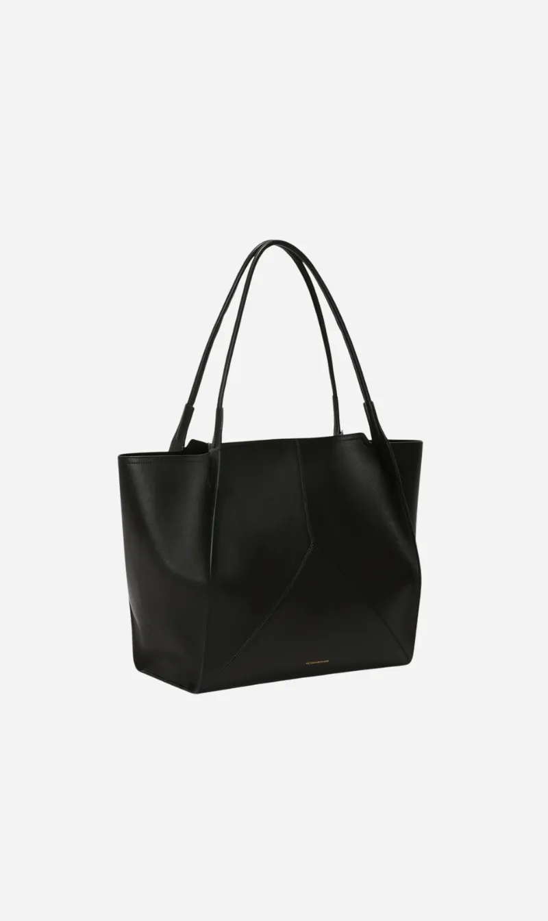 Victoria Beckham | The Victoria Soft Tote - Black sold by Sisters & Co