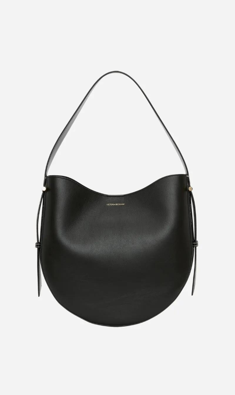 Victoria Beckham | The Dia Hobo Bag - Black sold by Sisters & Co