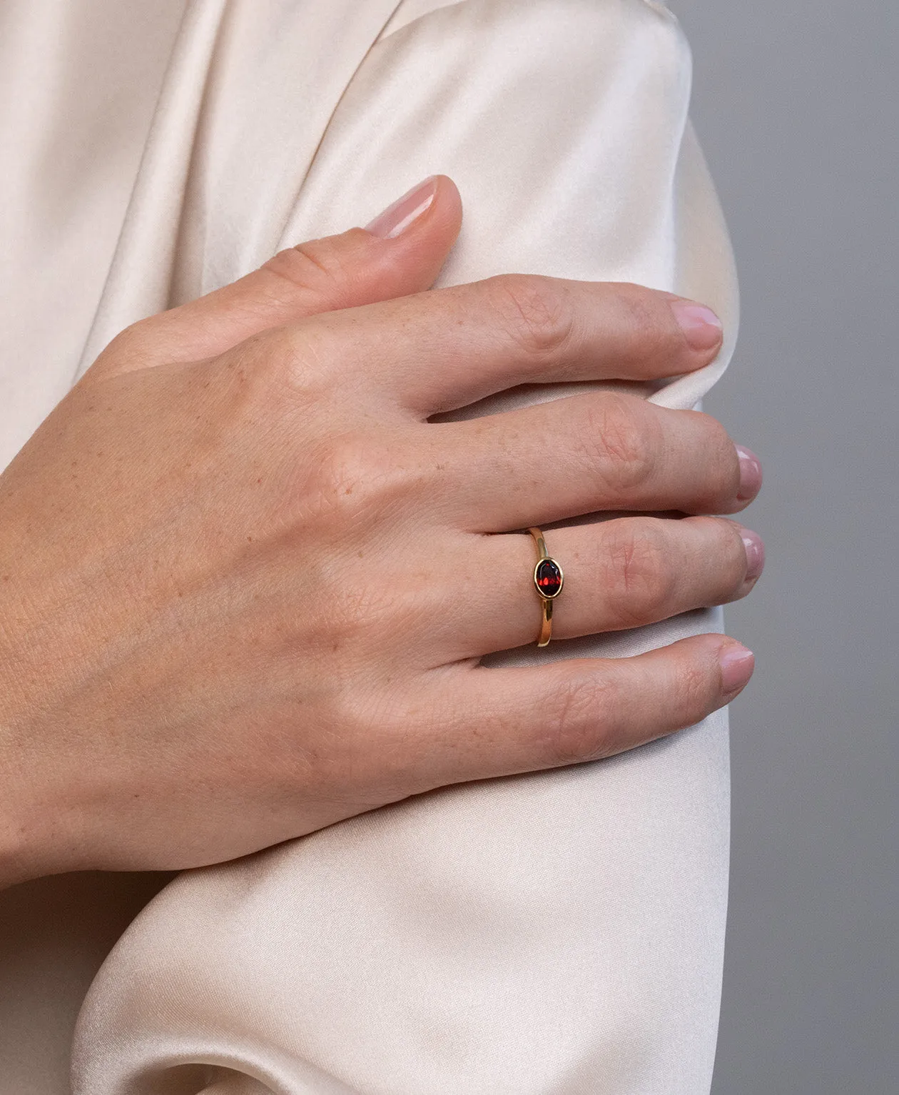 Zoe & Morgan | Mon Petit Stacking Ring - Gold/Oval Garnet sold by Sisters & Co product image thumbnail 2