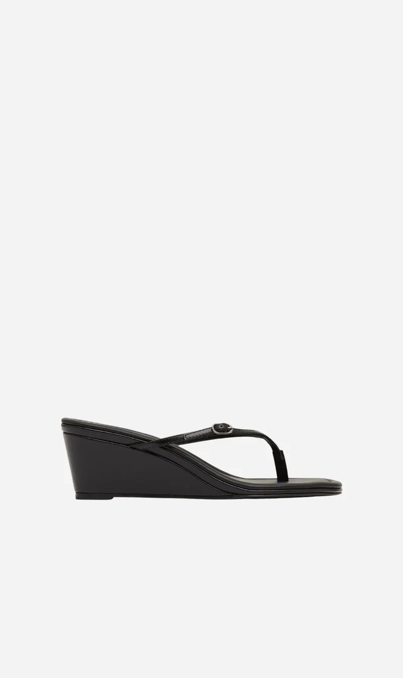 St Agni | Petit Belt Thong Wedge - Black sold by Sister & Co