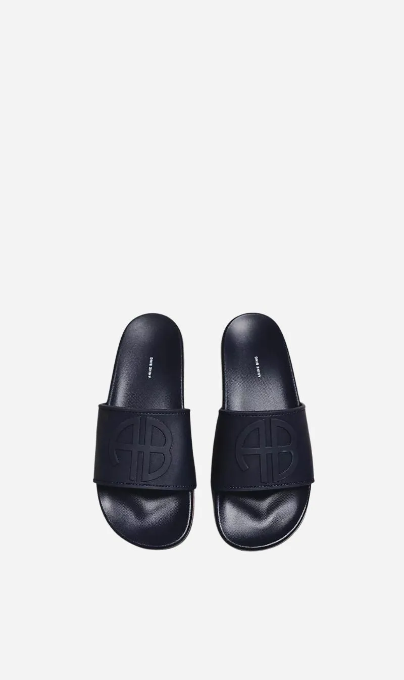 Anine Bing | Isla Slides - Marine Blue sold by Sisters & Co