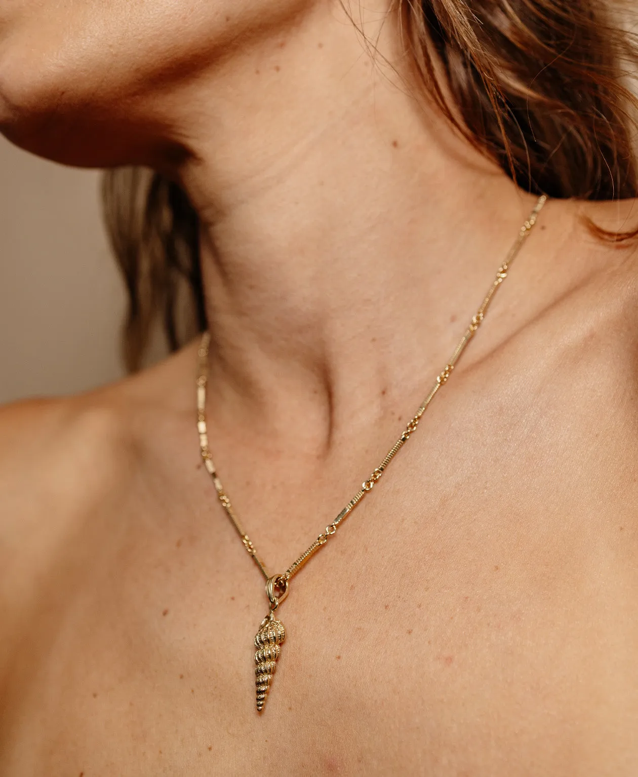 Zoe & Morgan | Shell Seeker Charm - Gold sold by Sisters & Co product image thumbnail 4