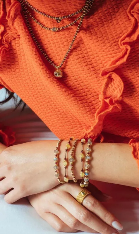 Tityaravy | Sriphala Thread Bracelet - Citrine/Garnet sold by Sisters & Co