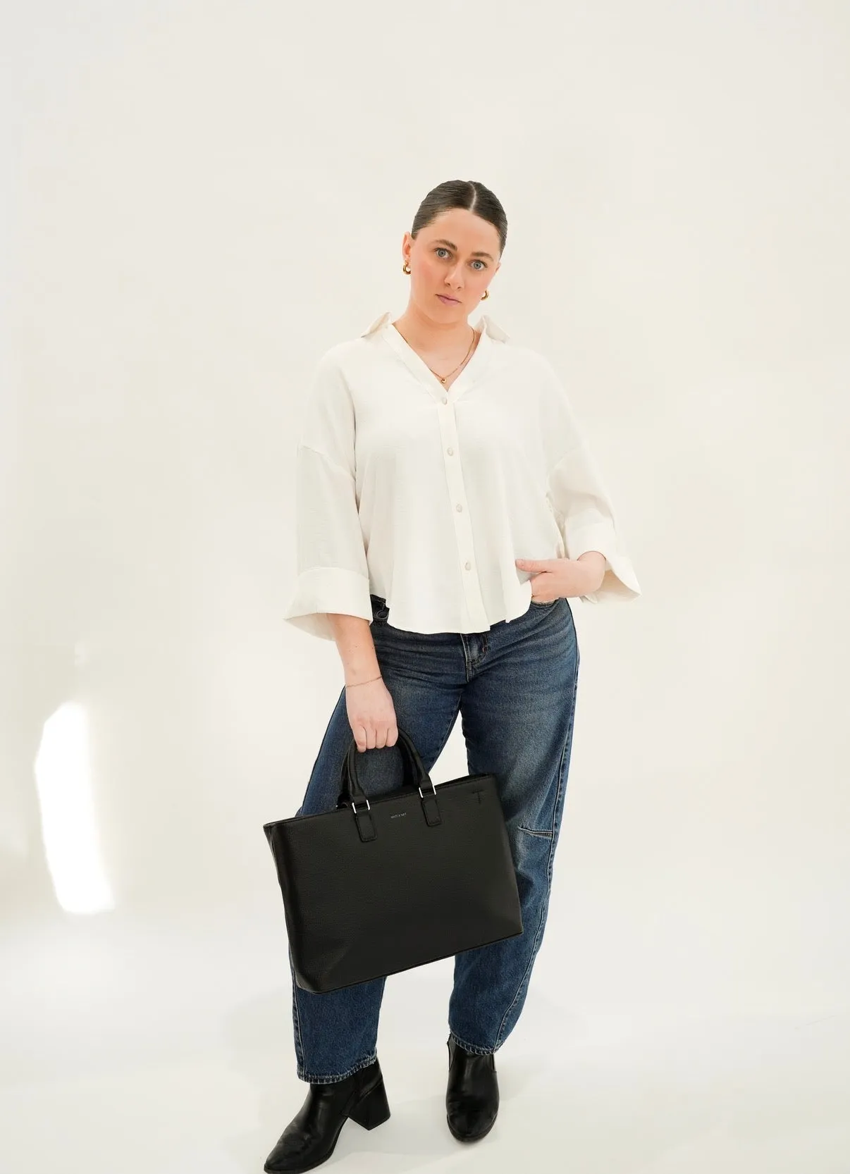 Cuffed Button Front Blouse sold by Bella Chic