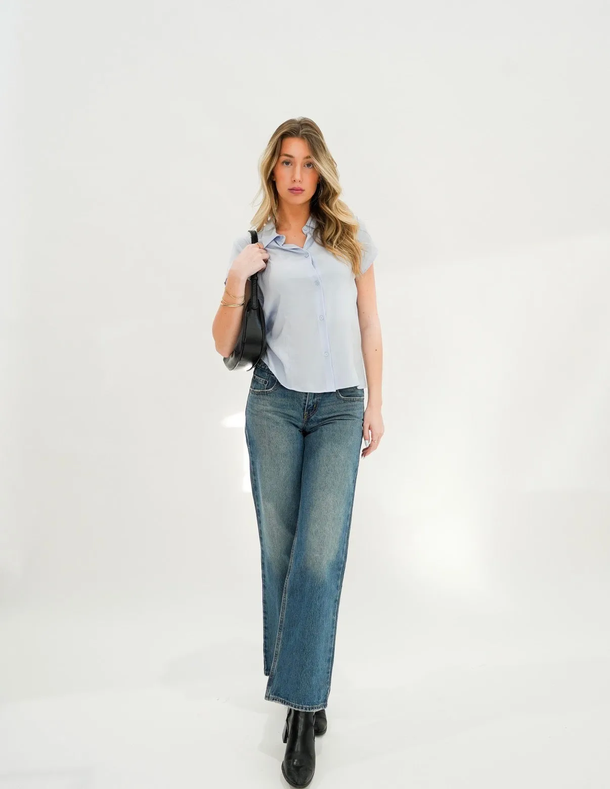 Textured Seamed Button Front Blouse sold by Bella Chic