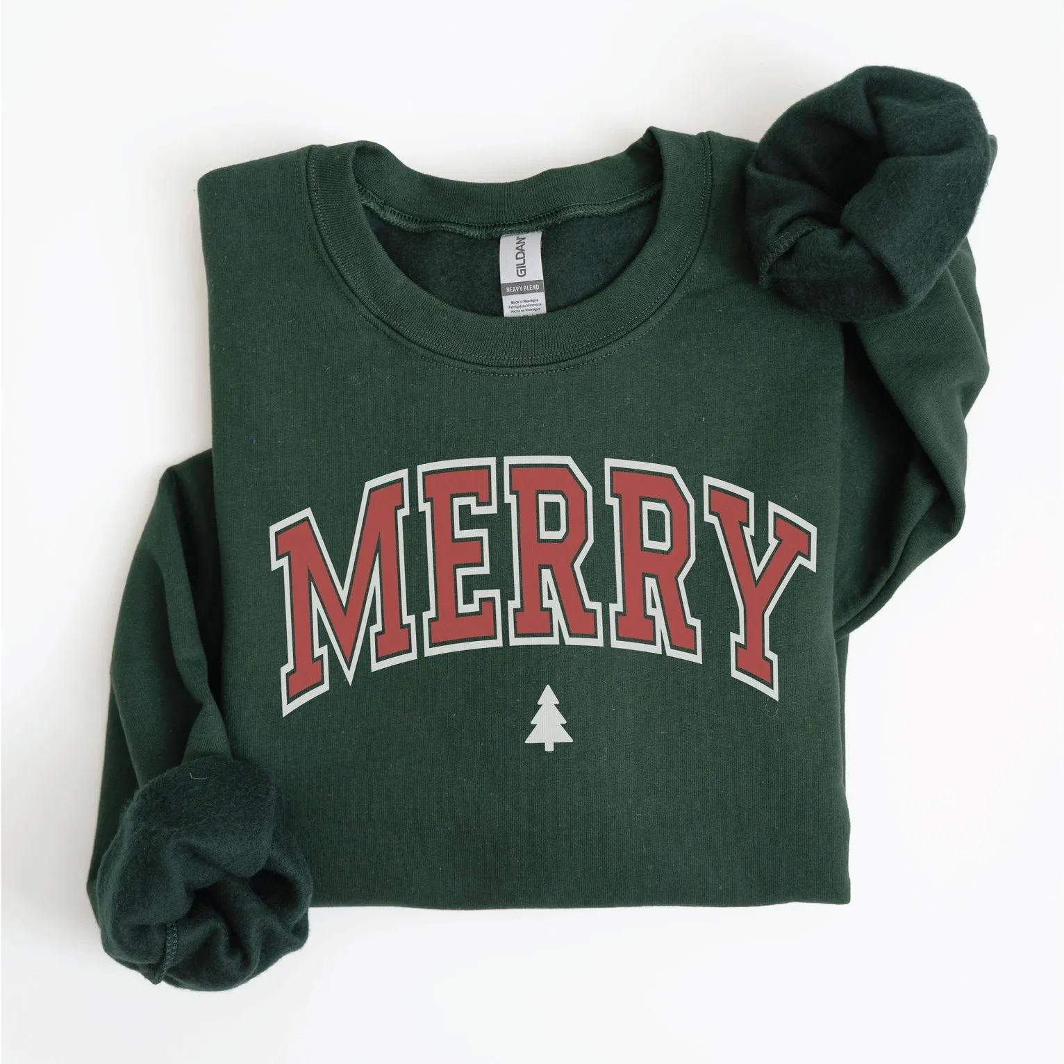 Merry Crewneck sold by Bella Chic