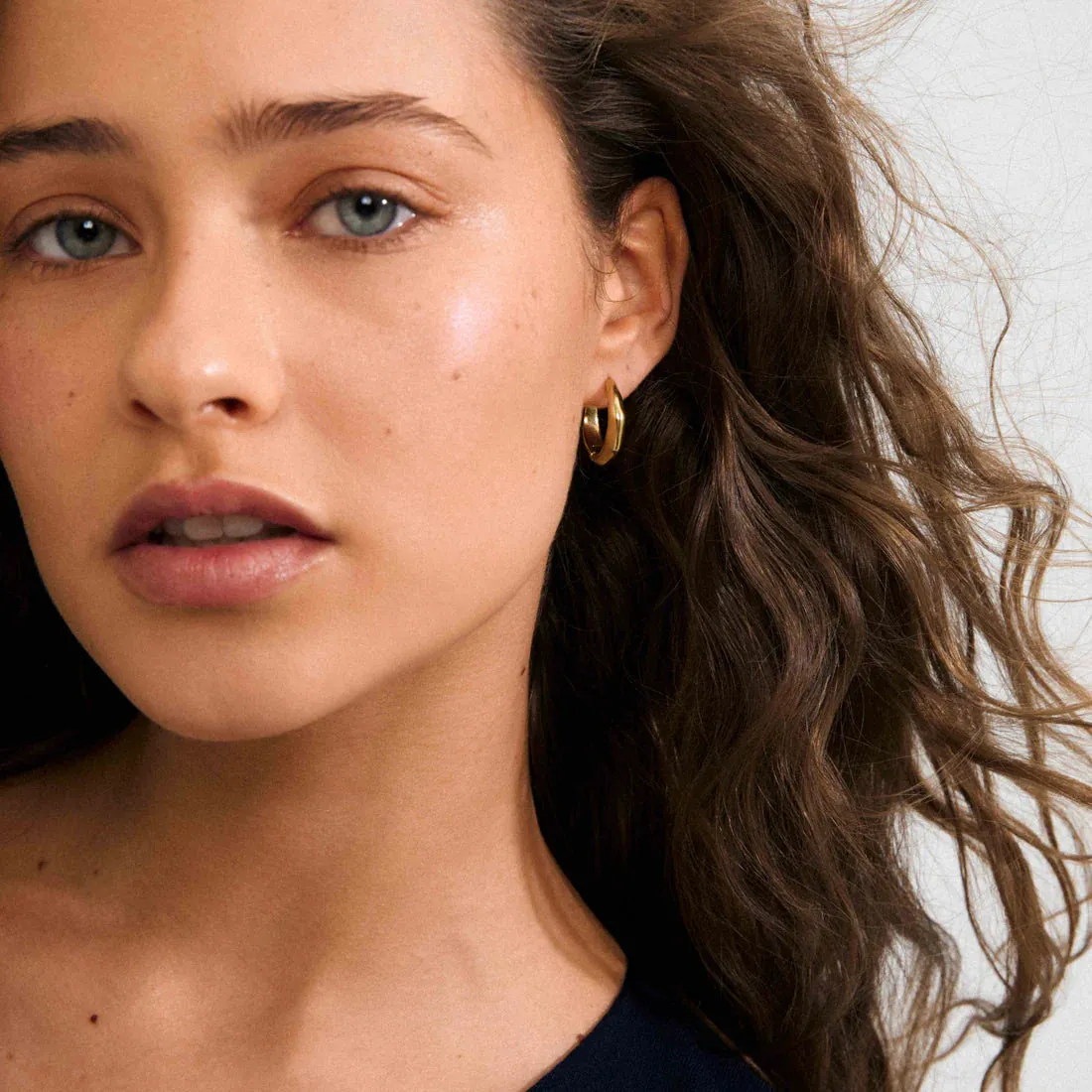 Harrison Recycled Wavy Hoop Earrings | Gold sold by Bella Chic product image thumbnail 2