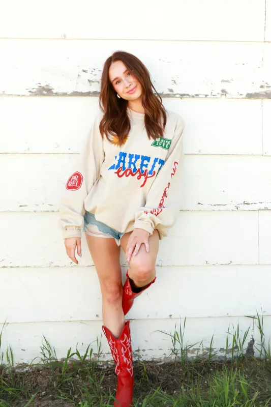 Lake It Easy Graphic Sweatshirt made by Bella Chic