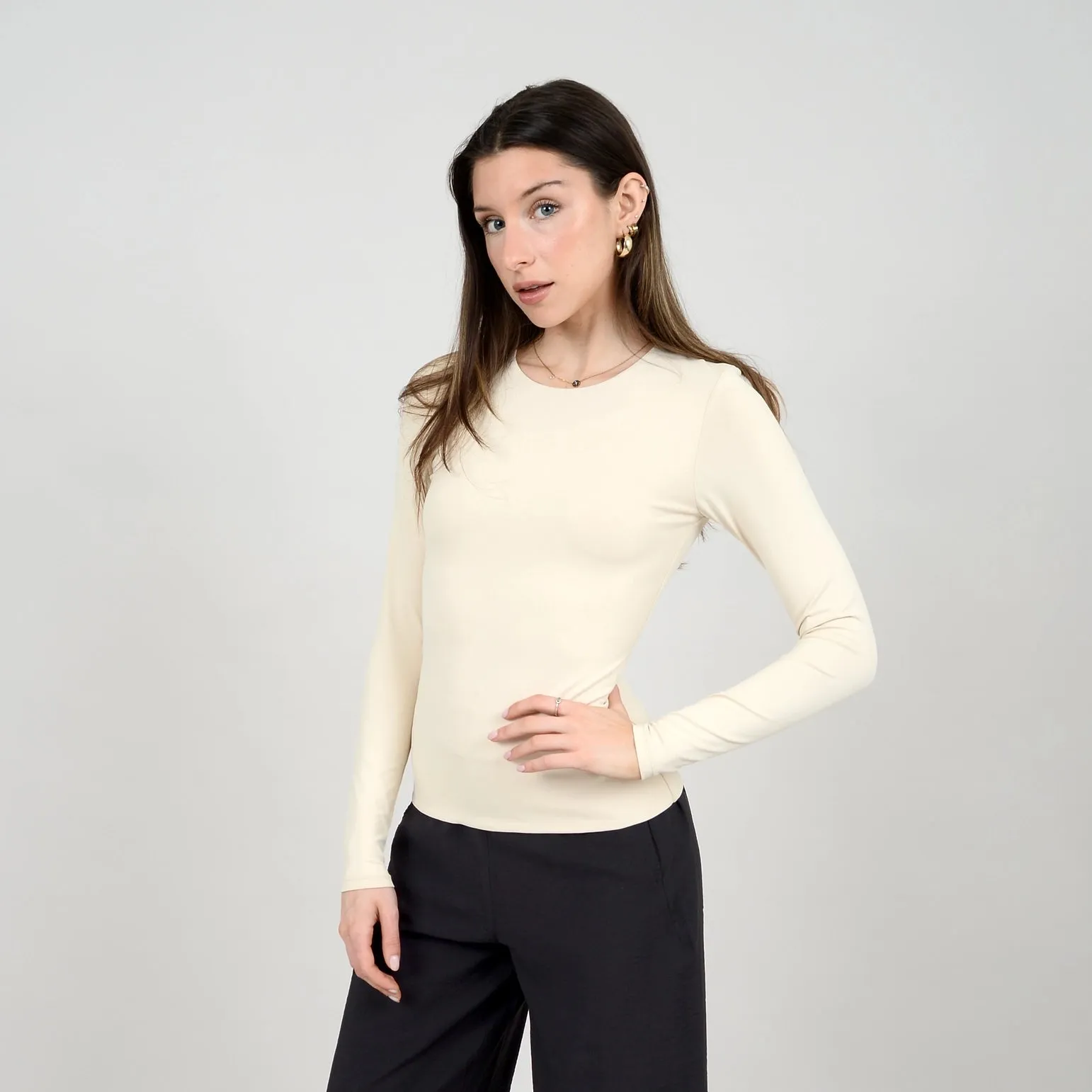 Roxi High Crew Neck Long Sleeve Bodysuit | Parchment sold by Bella Chic