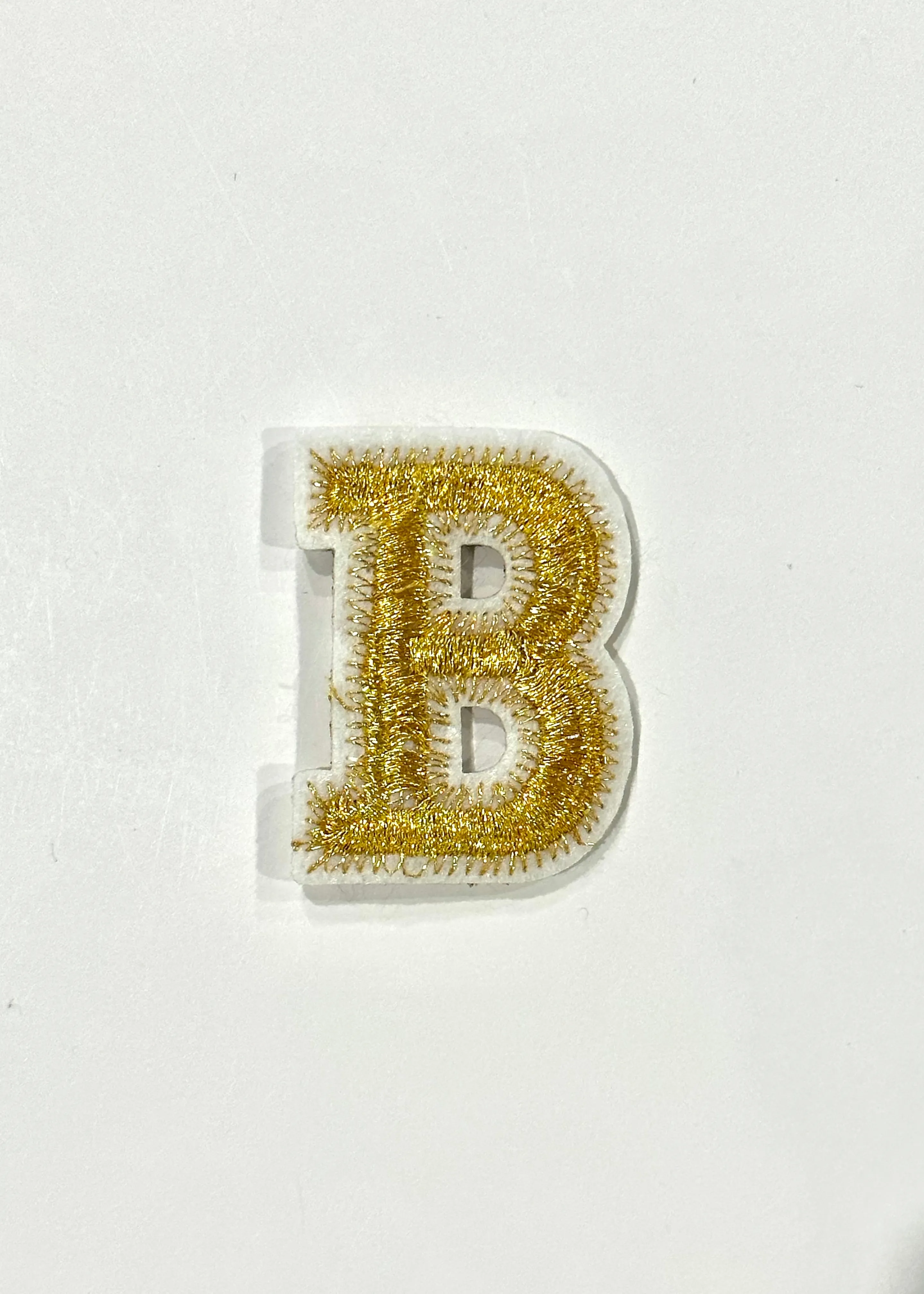 Gold Letter Zig Zag Stitch Patch sold by Bella Chic product image thumbnail 2