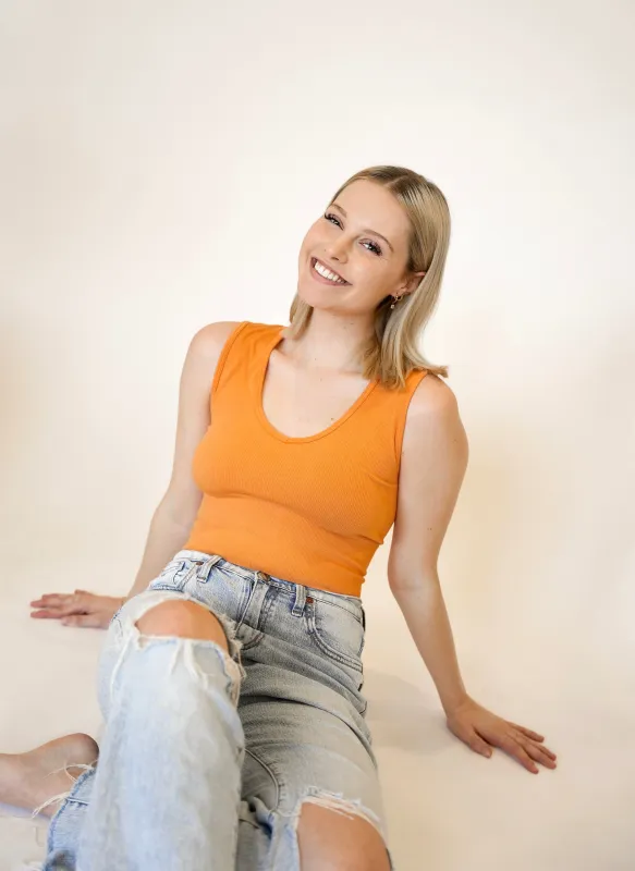 Sylvie Reversible Crew Vneck Top | Tangerine sold by Bella Chic