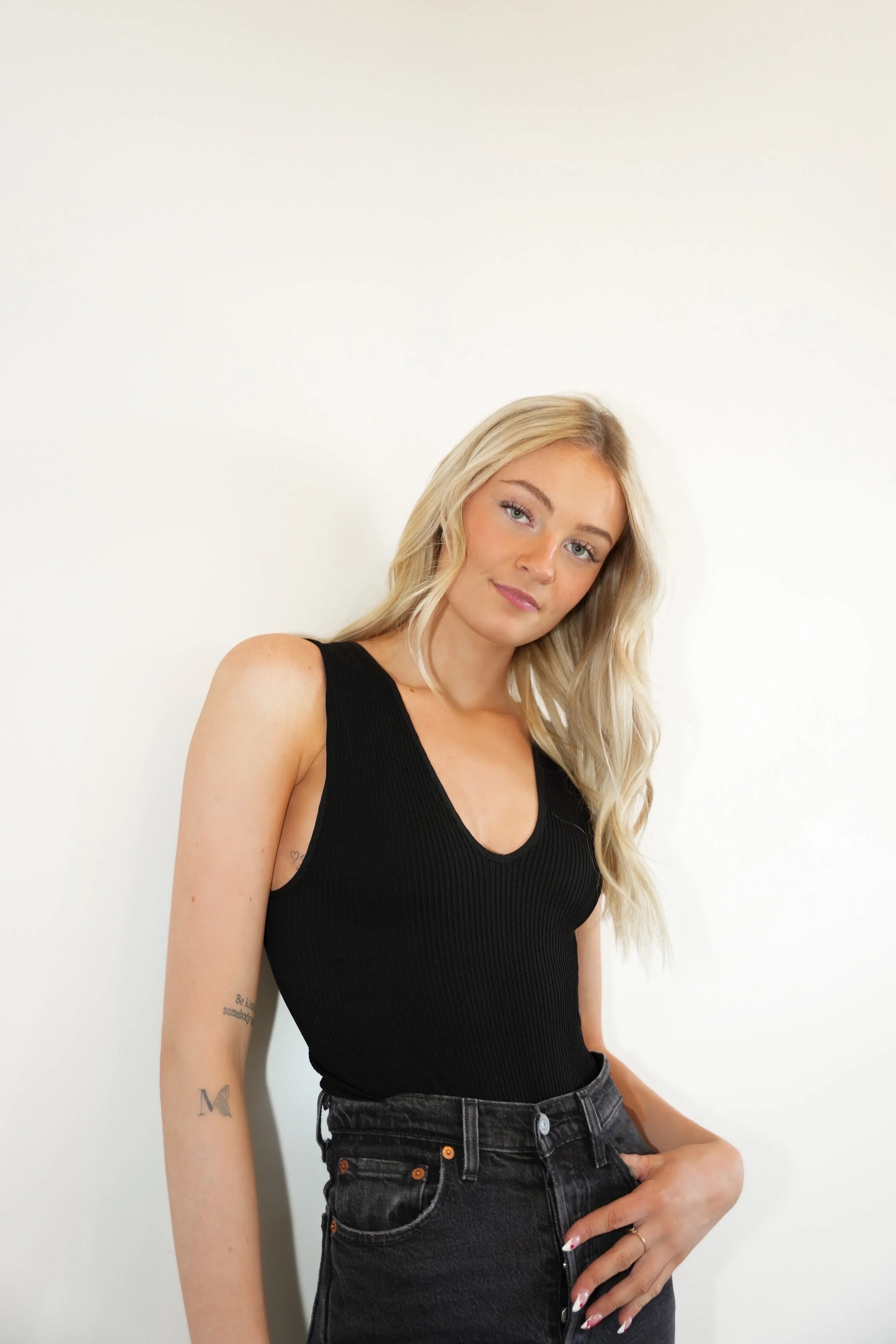Rib V-Neck Bodysuit | Black sold by Bella Chic