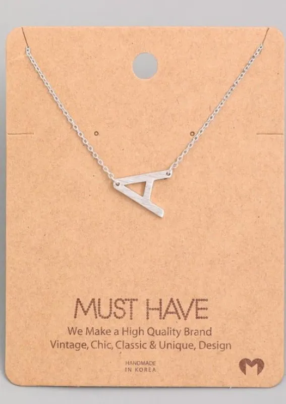 Must Have Hanging Initial Necklace | Silver sold by Bella Chic
