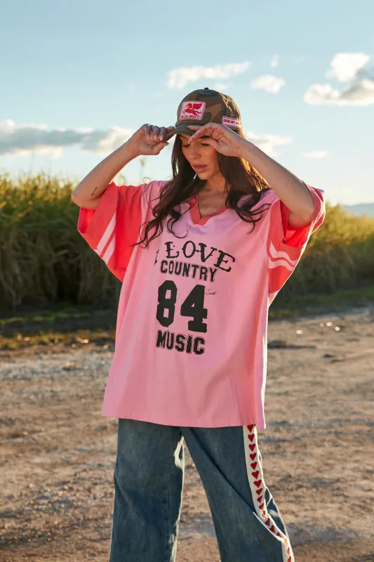 The Very Oversized Country Music V Neck Tee | Pink made by Bella Chic