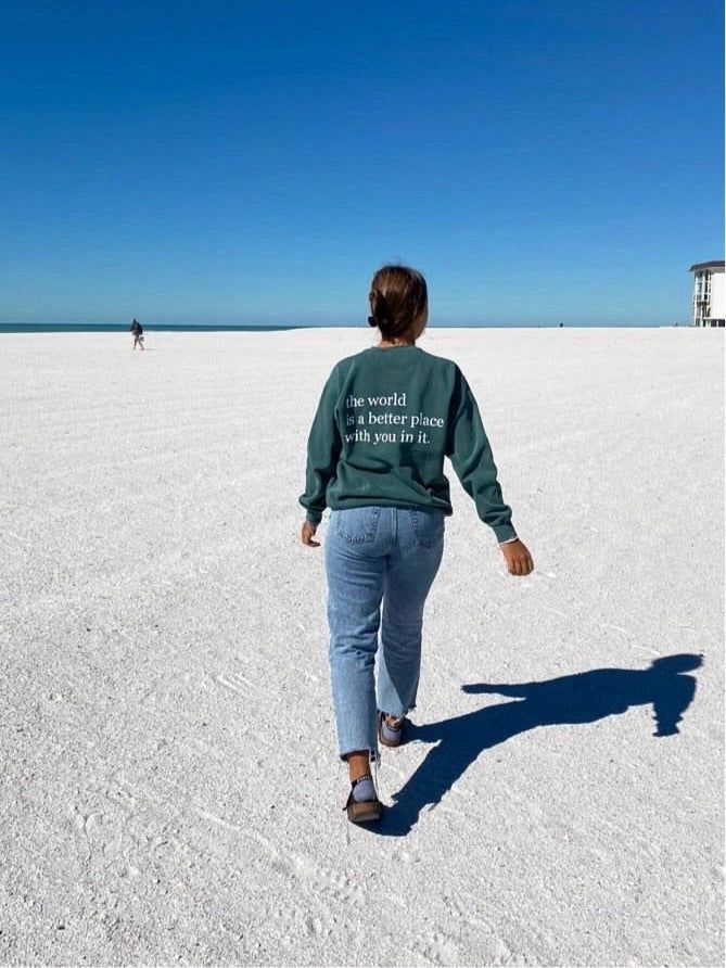 The World Is a Better Place Graphic Sweatshirt | Vintage Green sold by Bella Chic