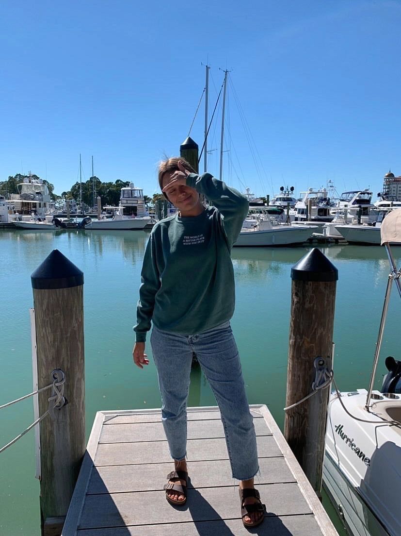 The World Is a Better Place Graphic Sweatshirt | Vintage Green sold by Bella Chic product image thumbnail 5