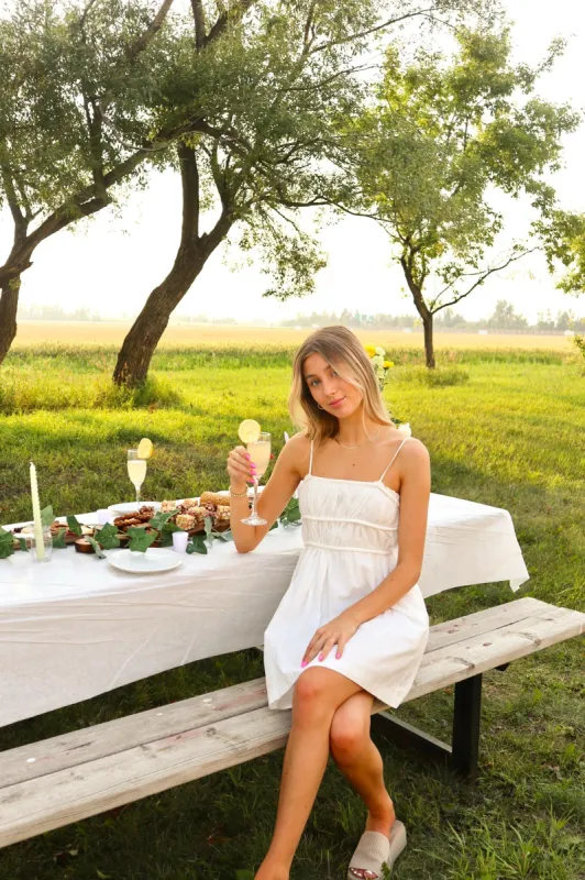 Claire Babydoll Mini Dress | White sold by Bella Chic