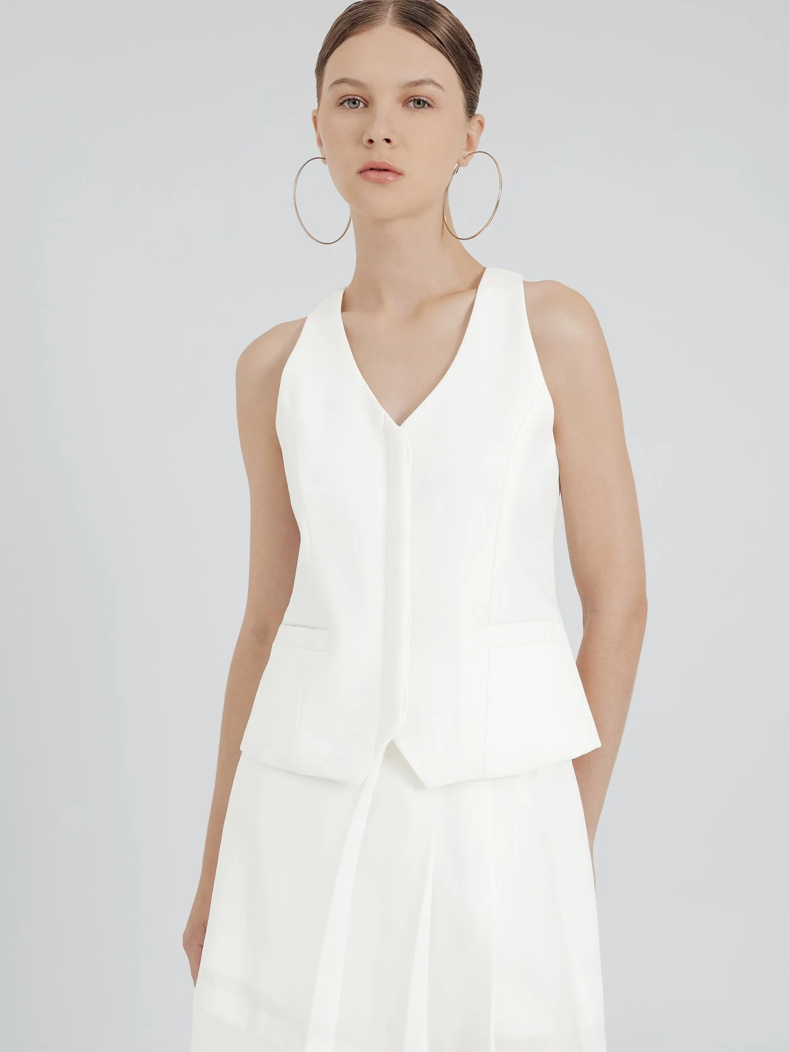 V-NECK VEST IN WHITE sold by BLZR.ID