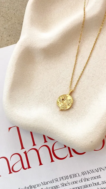 Ocean Coin Charm Necklace - Gold sold by Billy J