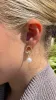 Wakanda Earrings - Gold sold by Billy J