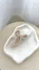 Matte Bow Claw Clip - Beige sold by Billy J