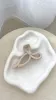 Matte Bow Claw Clip - Beige sold by Billy J
