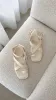 Ushi Sandal - Bone sold by Billy J