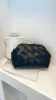 Vasanti Woven Clutch - Black sold by Billy J