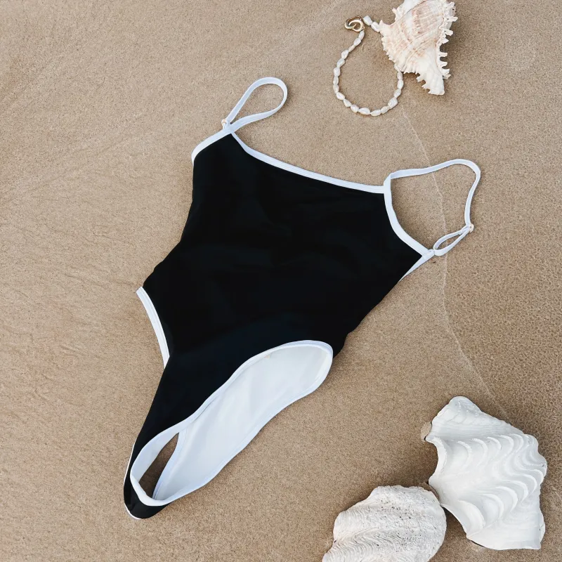 Back To Black One Piece sold by Sew Unique