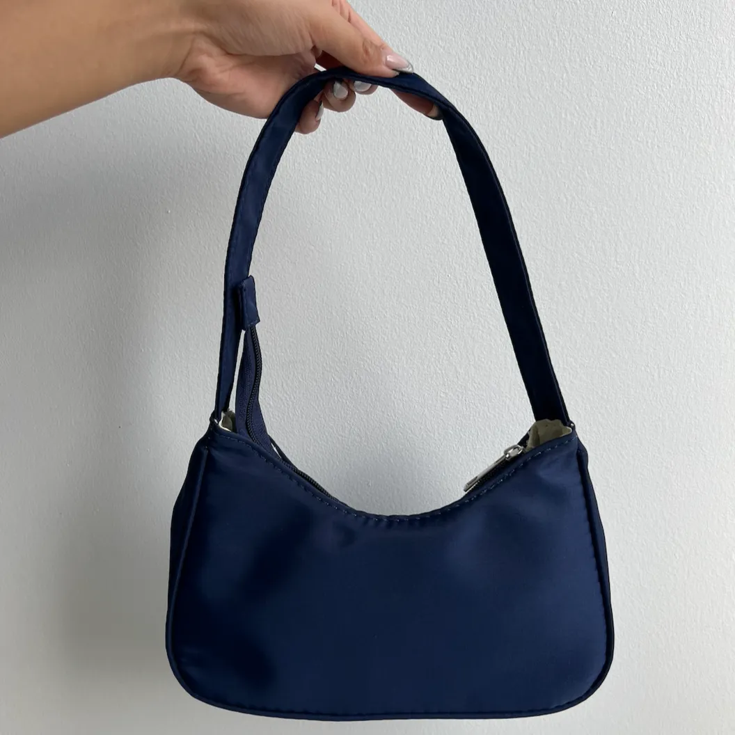 Azure Purse sold by Evry Jewels