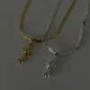 Crossed Necklace sold by Evry Jewels