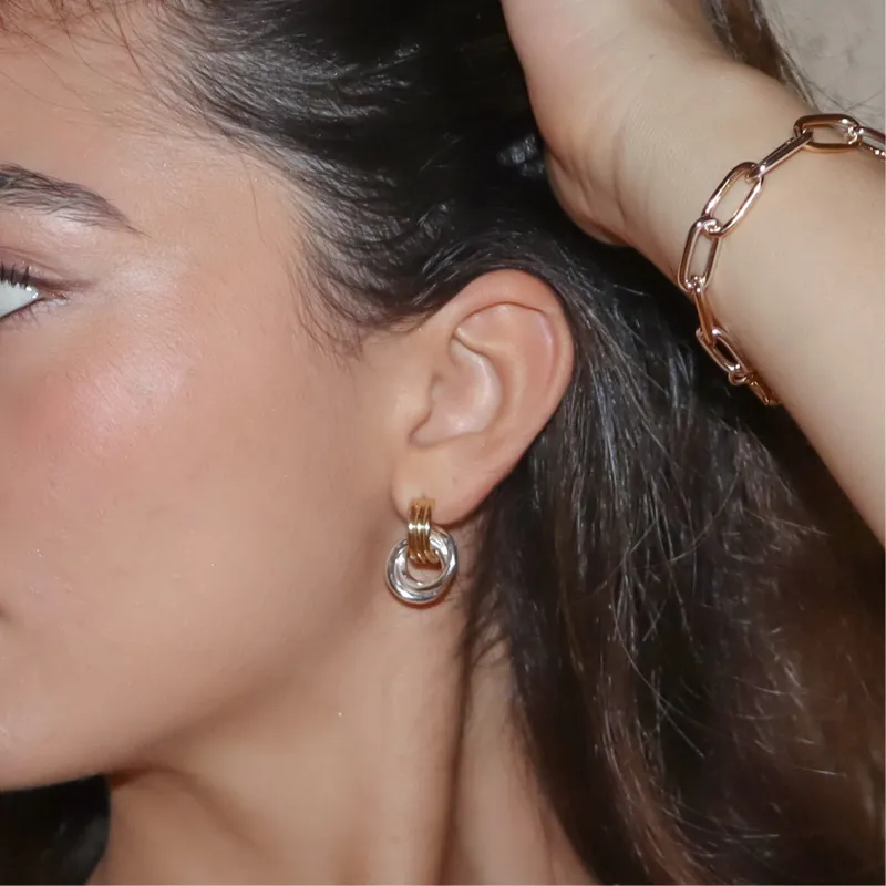 Interlock Earrings sold by Evry Jewels